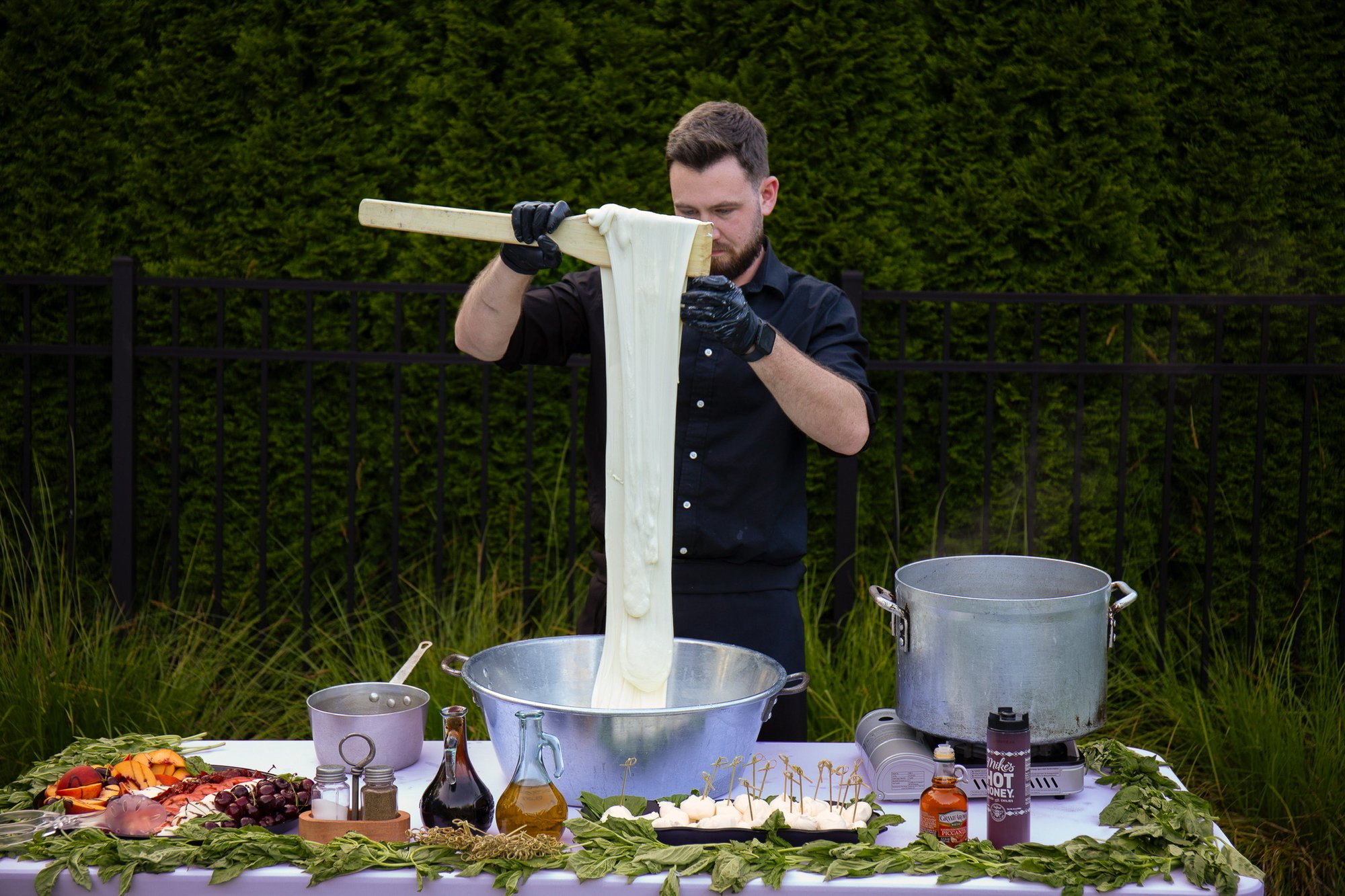 Fresh mozzarella station at an outdoor celebration